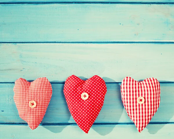 Vintage patterned sewn hearts — Stock Photo, Image