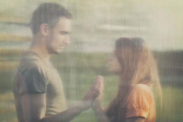 Couple through the mirror — Stock Photo, Image