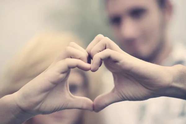 Couple shows sign of love — Stock Photo, Image