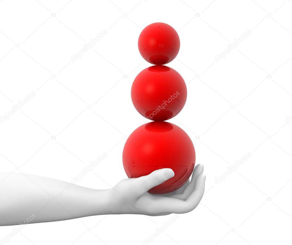 Hand holding spheres