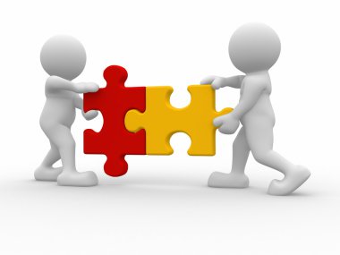 İki kişi eşleşen puzzle parçaları