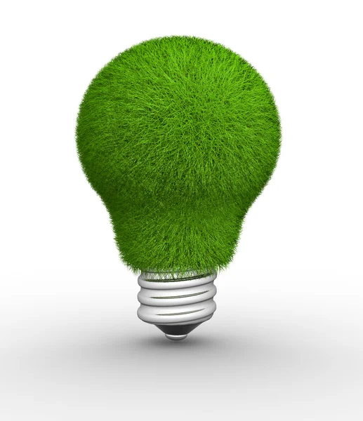 Light bulb made of green grass — Stock Photo, Image