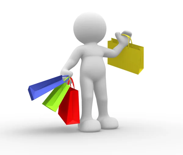 Ícone de pessoa com sacos de compras — Fotografia de Stock