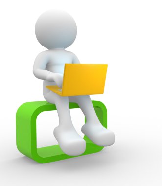 Dizüstü bilgisayar kullanan kişi