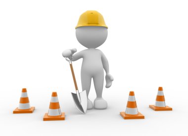 Kişi trafik konileri ve kürek ile