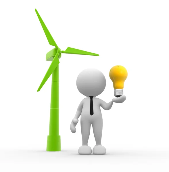 Person with wind turbine and light bulb — Stock Photo, Image