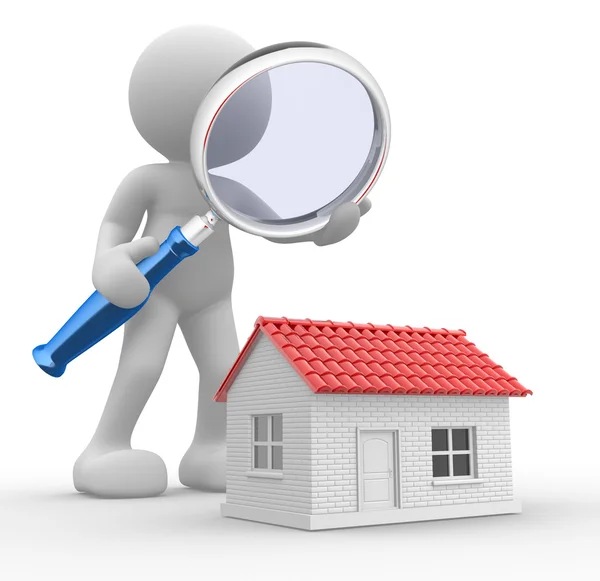 Person with magnifying glass and house — Stock Photo, Image