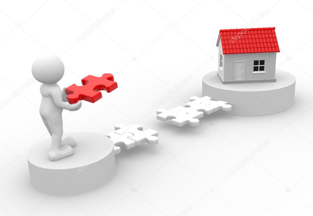 Man with piece of puzzle and a house