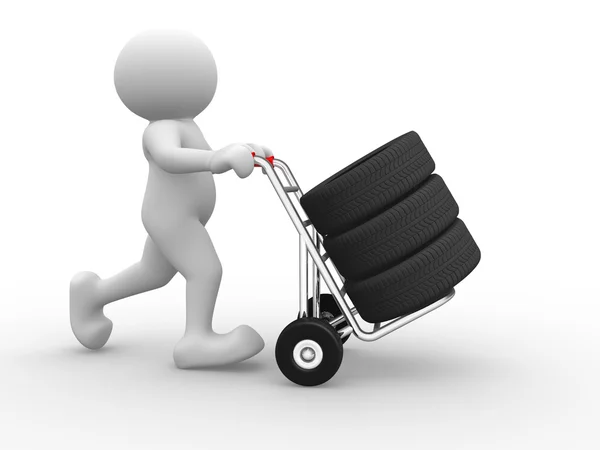 3d person and tyre on hand truck. — Stock Photo, Image