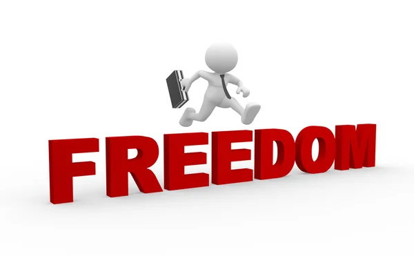 Person jumping over word freedom — Stock Photo, Image