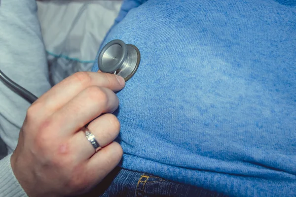 Pregnant belly and stethoscope — Stock Photo, Image
