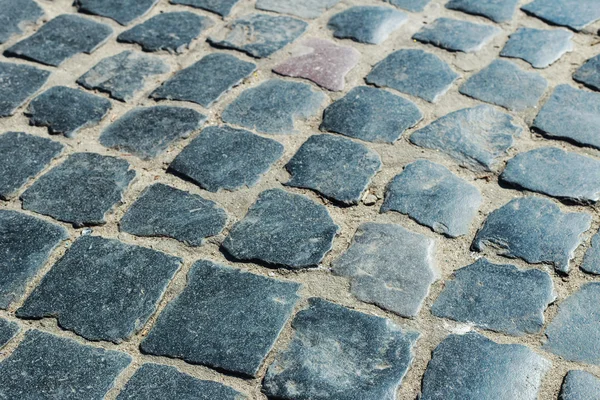 Gehweg aus alten Pflastersteinen — Stockfoto