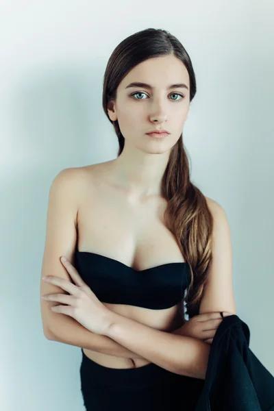 Young girl in a black dress — Stock Photo, Image