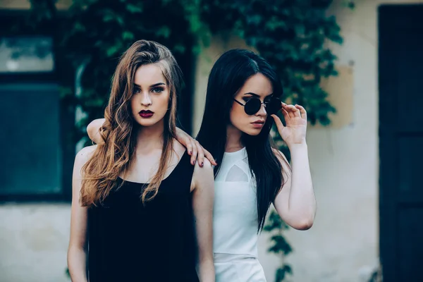 Two beautiful young girls in dresses — Stock Photo, Image