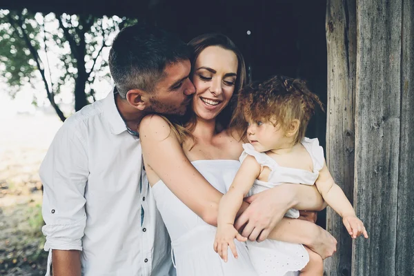 Mother, father and daughter together having fun — Stock Photo, Image