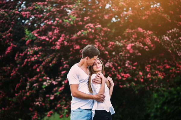 Young happy couple in love outdoors — Stock Photo, Image