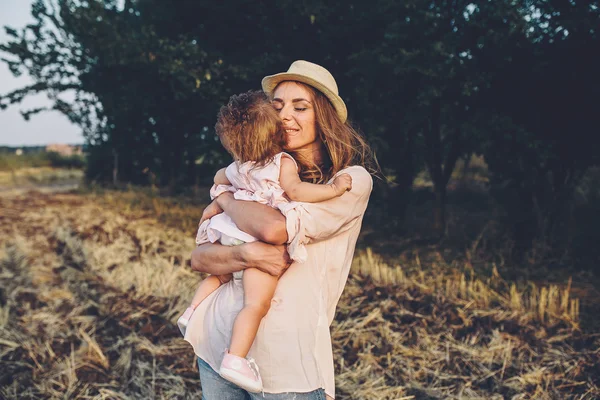 Mother and daughter together outdoors — Stock Photo, Image