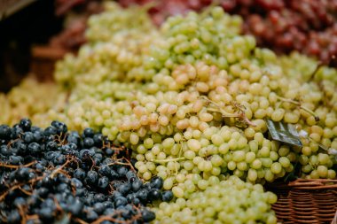 ripe white grapes on the market, close view