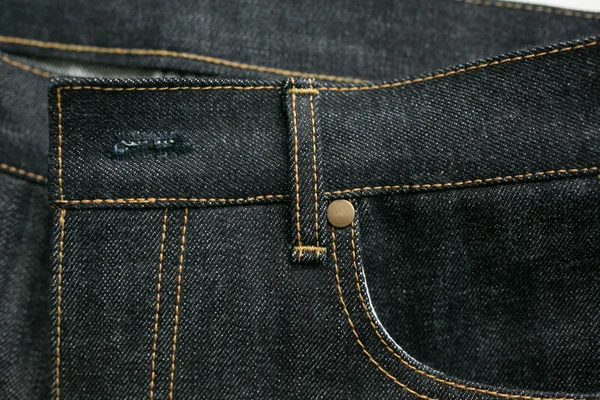 Selvedge denim jeans closeups — Stock Photo, Image