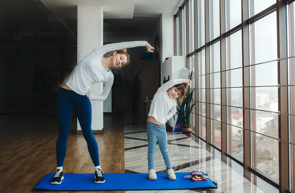 Charming family spends time in the gym — Stock Photo, Image