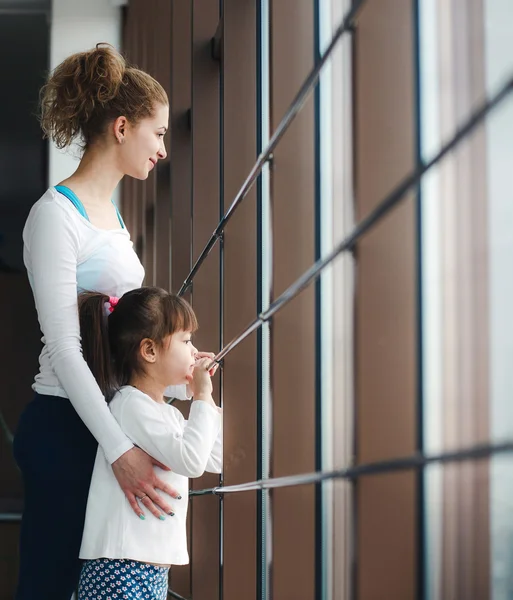 Charming family spends time in the gym