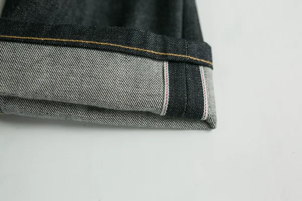 Selvedge denim jeans closeups — Stock Photo, Image