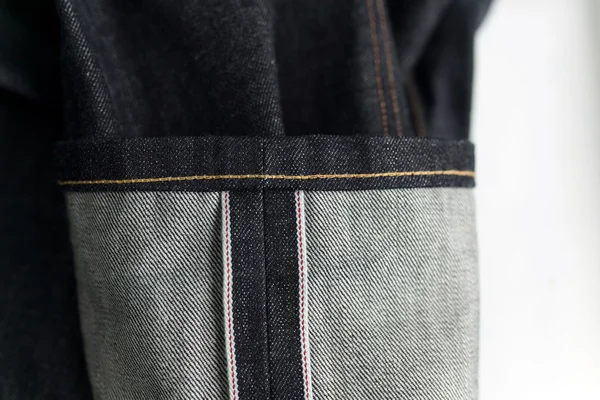 Selvedge denim jeans closeups — Stock Photo, Image