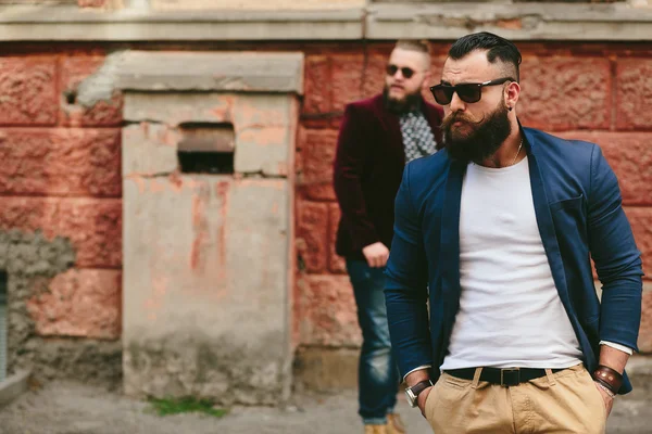 Two stylish bearded men on the background of each other — Stock Photo, Image