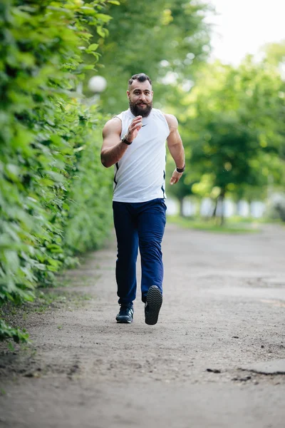 bearded man runs