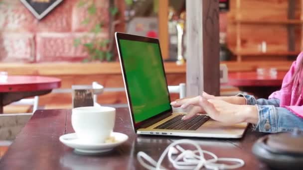 Two girls watching something in laptop — Stock Video