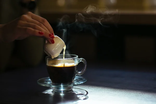 Coffee with cream on table — Stock Photo, Image