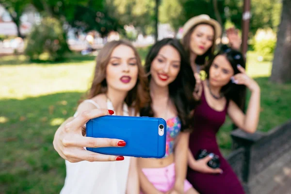 Four beautiful young girls make selfie — Stock Photo, Image