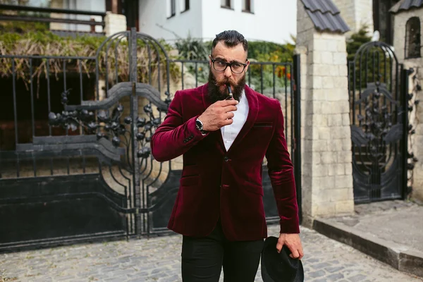 Rich man with a beard, thinking about business — Stock Photo, Image