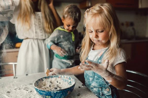 Kids is playing with flour Stock Image
