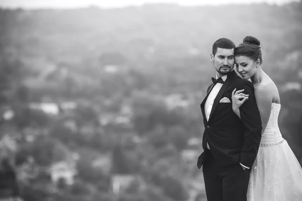 Wedding couple posing for the camera