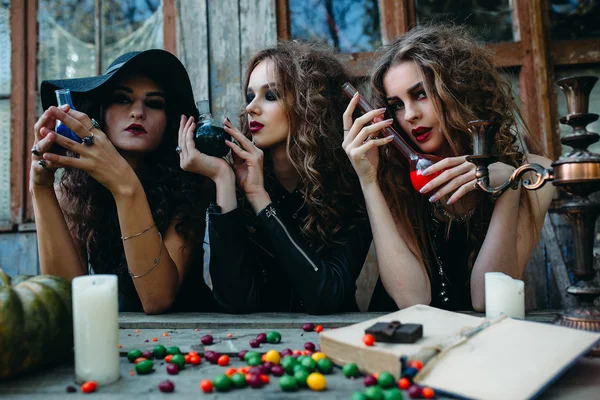 Three witches at the table — Stock Photo, Image