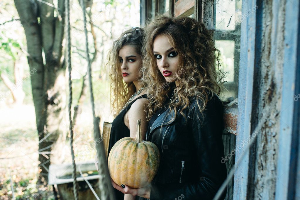 two vintage women as witches