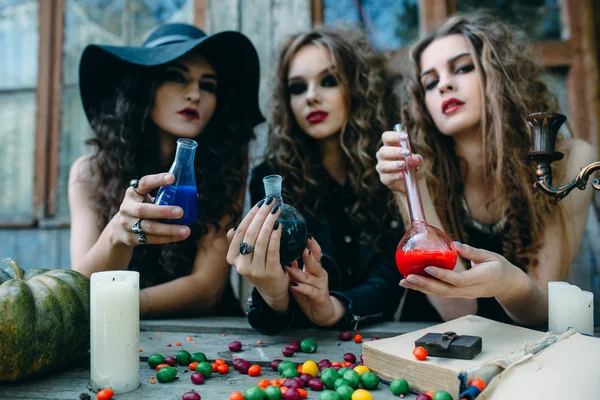 Three witches at the table — Stock Photo, Image