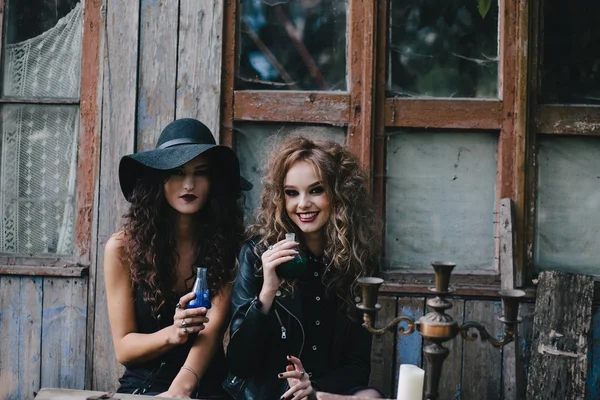 Two vintage witches perform magic ritual — Stock Photo, Image