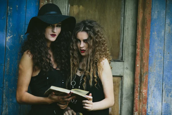 Two vintage women as witches — Stock Photo, Image