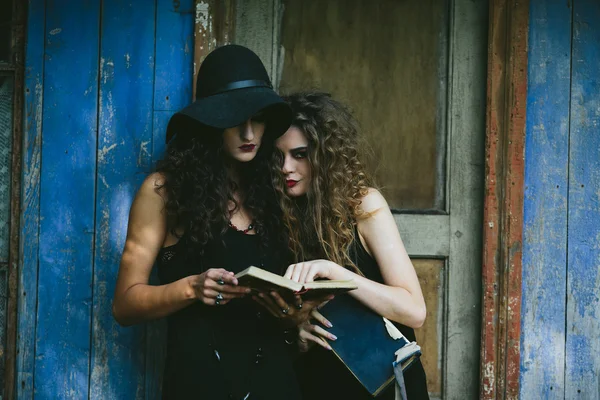 Two vintage women as witches — Stock Photo, Image
