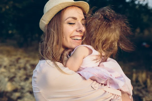 Mother and daughter together outdoors — Stock Photo, Image