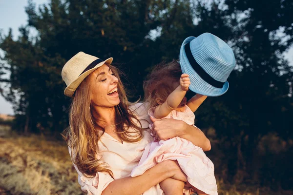 Mother and daughter together outdoors — Stock Photo, Image