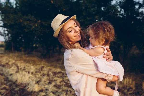Mother and daughter together outdoors — Stock Photo, Image