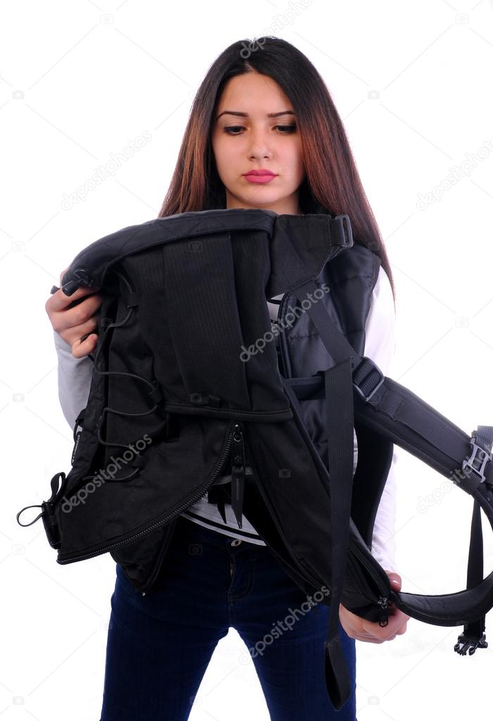 Girl looking for something backpack