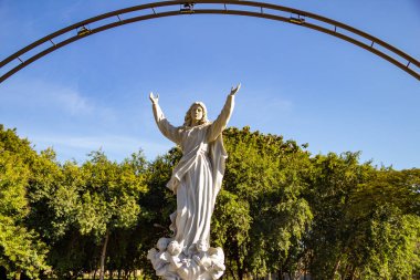 Image of a saint in front of the church Our Lady of the Assumption. (Igreja Nossa Senhora da Assuno)