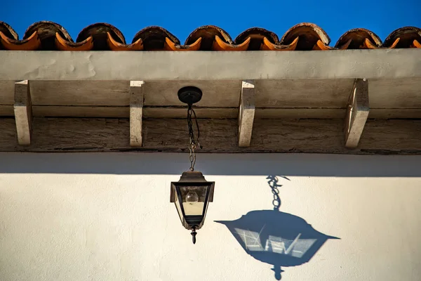 Detail of a light fixture in a house in the city of Pirenpolis. A tourist city and famous for being built in the colonial style.