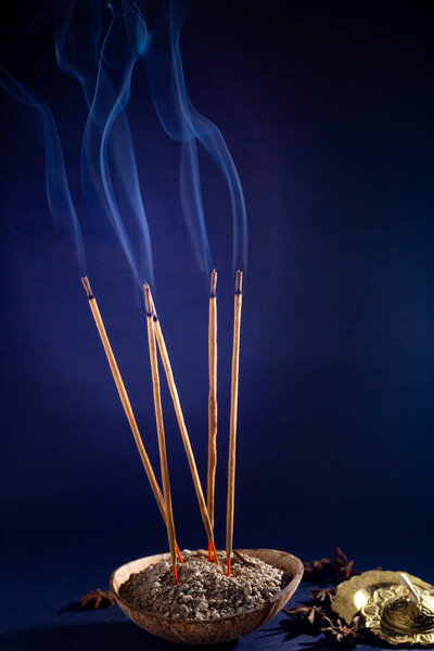Friday 13. Some incense lit emitting a fragrant smoke with the intention of purifying the place.