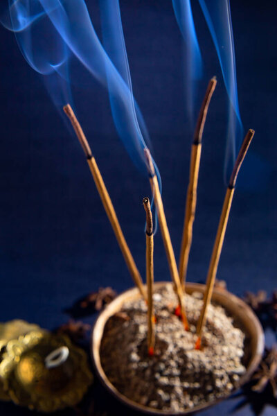 Friday 13. Some incense lit emitting a fragrant smoke with the intention of purifying the place.