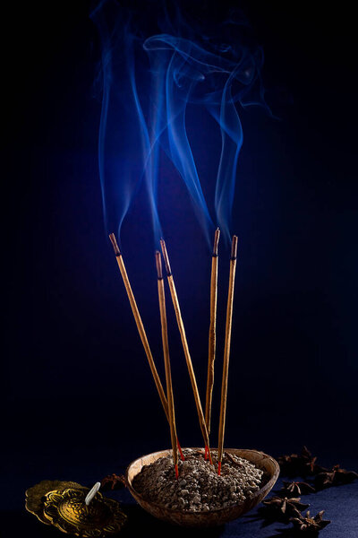  Friday 13. Some incense lit emitting a fragrant smoke with the intention of purifying the place.